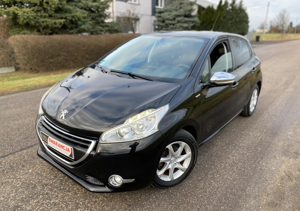 Peugeot 208 cena 26890 przebieg: 148463, rok produkcji 2014 z Strzyżów małe 781